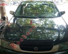 Mazda 323 2001 - Bán xe Mazda 323 sản xuất 2001, màu đen chính chủ giá 175 triệu tại Cao Bằng