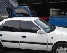 Mazda 323   MT 1989 - Cần bán Mazda 323 MT đời 1989, màu trắng, 58tr giá 58 triệu tại Tp.HCM