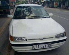 Mazda 323    MT 1995 - Bán xe Mazda 323 MT sản xuất 1995, màu trắng giá 130 triệu tại An Giang