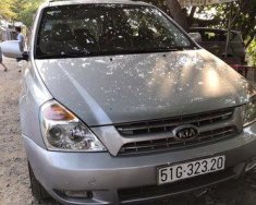 Kia Carnival 2011 - Bán Kia Carnival đời 2011, màu bạc   giá 450 triệu tại Tp.HCM