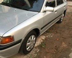 Mazda 323   1995 - Bán xe cũ Mazda 323 đời 1995, màu bạc xe gia đình giá 82 triệu tại Bến Tre