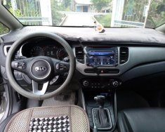 Kia Rondo 2.0 GAT 2016 - Cần bán xe Kia Rondo 2.0 GAT đời 2016, màu bạc xe gia đình, giá tốt giá 570 triệu tại Vĩnh Long