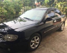 Kia Spectra   MT 2004 - Chính chủ bán Kia Spectra MT sản xuất 2004, màu đen giá 170 triệu tại Quảng Trị