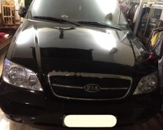 Kia Carnival GS 2006 - Bán Kia Carnival GS đời 2006, màu đen như mới, giá 255tr giá 255 triệu tại Tp.HCM