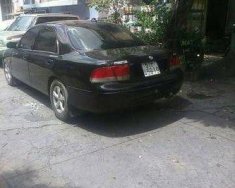 Mazda 626  MT 1996 - Bán xe Mazda 626 MT đời 1996, màu đen số sàn giá 130 triệu tại Tp.HCM