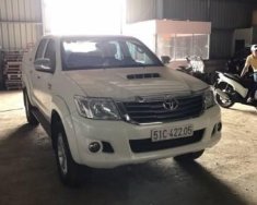 Toyota Hilux   G  2014 - Chính chủ bán Toyota Hilux G 2014, màu trắng giá 630 triệu tại Tp.HCM