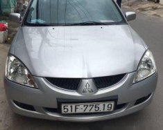 Mitsubishi Lancer 2006 - Cần bán gấp Mitsubishi Lancer đời 2006, màu bạc số sàn giá 265 triệu tại Tp.HCM