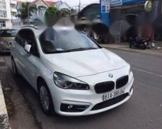 BMW 2 Series  218i  2015 - Bán BMW 2 Series 218i đời 2015, màu trắng, xe nhập đẹp như mới giá cạnh tranh giá 950 triệu tại Bình Dương