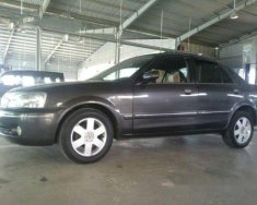 Ford Laser 2003 - Bán ô tô Ford Laser sản xuất 2003, màu đen số sàn, giá tốt giá 215 triệu tại Kon Tum