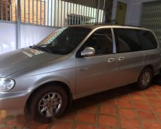 Kia Carnival 2000 - Cần bán Kia Carnival đời 2000, màu xám giá 175 triệu tại Đắk Lắk