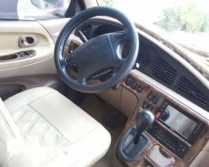 Kia Carnival AT  2000 - Cần bán lại xe Kia Carnival AT đời 2000, 205 triệu giá 205 triệu tại Bình Dương