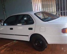 Mazda 2  MT 2002 - Cần bán Mazda 2 MT sản xuất 2002, màu trắng chính chủ giá 170 triệu tại Bình Định