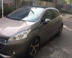 Peugeot 208 2014 - Cần bán lại xe Peugeot 208 đời 2014, màu nâu giá 500 triệu tại Tp.HCM