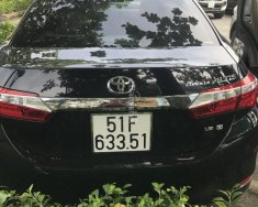 Toyota Corolla altis G  2016 - Bán xe Toyota Corolla Altis G AT 2016, màu đen giá 700 triệu tại Tp.HCM