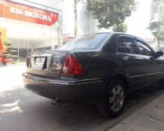 Ford Laser  Ghina 1.8 2002 - Bán Ford Laser Ghina 1.8 đời 2002, màu đen giá 215 triệu tại Kon Tum