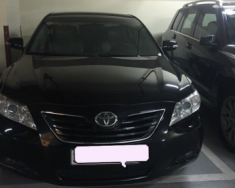 Toyota Camry GLX 2009 - Cần bán gấp Toyota Camry GLX đời 2009, màu đen chính chủ giá 699 triệu tại Hà Nội