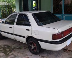 Mazda 323 1995 - Cần bán lại xe Mazda 323 đời 1995, màu trắng, xe nhập, giá 72tr giá 72 triệu tại An Giang