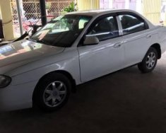 Kia Spectra  LS 2004 - Cần bán xe Kia Spectra LS sản xuất 2004, màu trắng giá 125 triệu tại Long An