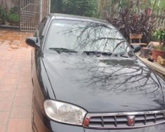 Kia Spectra 1.6 MT 2004 - Bán Kia Spectra 1.6 MT năm 2004, màu đen giá 120 triệu tại Tuyên Quang