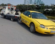 Ford Taurus   AT  1997 - Cần bán lại xe Ford Taurus AT đời 1997, màu vàng, 150tr giá 150 triệu tại Hà Nội