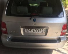 Kia Carnival 2005 - Bán Kia Carnival đời 2005, màu bạc giá 250 triệu tại Long An