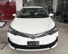 Toyota Corolla altis 2018 - Bán ô tô Toyota Corolla altis sản xuất 2018, màu trắng, giá chỉ 658 triệu giá 658 triệu tại Kiên Giang