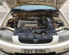 Mazda 323 MT 2000 - Bán xe Mazda 323 MT năm sản xuất 2000, màu trắng giá 98 triệu tại Vĩnh Phúc