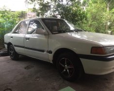 Mazda 323 1.6 MT 2001 - Cần bán gấp Mazda 323 1.6 MT năm 2001, màu trắng giá 68 triệu tại An Giang