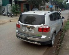 Chevrolet Orlando LT 1.8 MT 2013 - Cần bán lại xe Chevrolet Orlando LT 1.8 MT đời 2013, màu bạc   giá 418 triệu tại Thanh Hóa