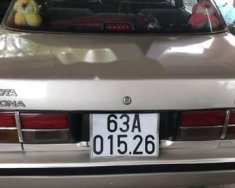 Toyota Corolla altis 2.0  1990 - Cần bán xe Toyota Corolla Altis 2.0 năm sản xuất 1990, màu ghi vàng giá 105 triệu tại Bình Dương