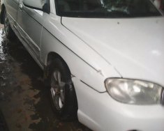 Kia Spectra 1.6 MT 2004 - Cần bán xe Kia Spectra 1.6 MT đời 2004, màu trắng, 106 triệu giá 106 triệu tại Bình Định