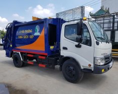 Xe tải 1250kg 2018 - Bán trả góp xe ép rác Hino 6 khối giá 940 triệu tại Bình Dương