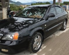 Daewoo Magnus 2.5 AT 2004 - Cần bán xe Daewoo Magnus 2.5 AT đời 2004, màu đen giá 155 triệu tại Khánh Hòa