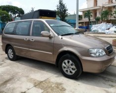 Kia Carnival GS  2009 - Bán xe Kia Carnival GS đời 2009, màu nâu xe gia đình giá cạnh tranh giá 285 triệu tại Tiền Giang