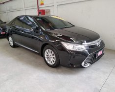 Toyota Camry E 2015 - Cần bán xe Toyota Camry E 2015, màu đen, xe cực đẹp, giá thương lượng giá 920 triệu tại Tp.HCM