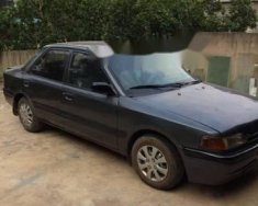 Mazda 323 1993 - Cần bán lại xe Mazda 323 đời 1993, màu đen, 40 triệu giá 40 triệu tại Tuyên Quang