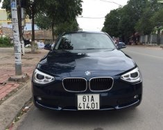 BMW 1 Series 116i 2014 - Cần bán BMW 1 Series 116i sản xuất 2014, màu xanh lam, xe nhập giá 885 triệu tại Bình Dương