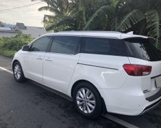 Kia Sedona GAT 2015 - Bán Kia Sedona 2015 màu trắng, số tự động giá 1 tỷ tại Tp.HCM