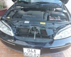 Ford Mondeo 2.0AT 2005 - Chính chủ bán Ford Mondeo 2.0AT năm 2005, màu đen giá 260 triệu tại Sóc Trăng