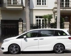 Honda Odyssey 2011 - Cần bán xe Honda Odyssey sản xuất năm 2011, màu trắng, nhập khẩu nguyên chiếc giá 1 tỷ 680 tr tại Tp.HCM