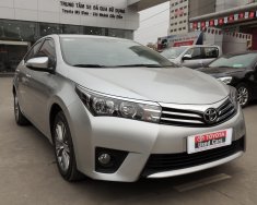 Toyota Corolla 1.8G 2016 - Cần bán Toyota Corolla 1.8G đời 2016, màu bạc giá 695 triệu tại Hà Nội