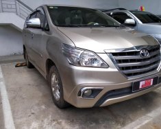 Toyota Innova V 2014 - Bán xe Toyota Innova V, tự động, màu nâu vàng 2014 giá 680 triệu tại Tp.HCM