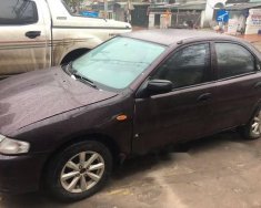 Mazda 323 2000 - Bán xe Mazda 323 đời 2000, xe nhập khẩu, màu nâu tím, máy còn nguyên bản giá 145 triệu tại Quảng Ninh