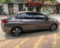 Honda City  1.5AT  2010 - Chính chủ bán Honda City 1.5AT đời 2010, màu nâu giá 525 triệu tại Hà Nội