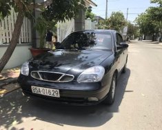 Daewoo Nubira 2002 - Cần bán xe Daewoo Nubira đời 2002, màu đen  giá 120 triệu tại Ninh Thuận