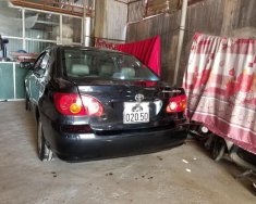 Toyota Corolla J 1.3 MT 2003 - Cần bán Toyota Corolla J 1.3 MT đời 2003, màu đen số sàn giá 155 triệu tại Sơn La