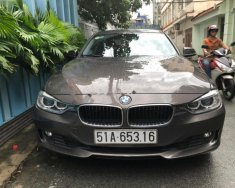 BMW 3 Series 328i 2013 - Cần bán BMW 3 Series 328i sản xuất năm 2013, màu nâu, xe nhập   giá 950 triệu tại Tp.HCM