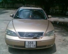 Ford Mondeo 2004 - Cần bán lại xe Ford Mondeo năm 2004, màu vàng, giá rẻ giá 180 triệu tại Kiên Giang