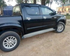 Toyota Hilux MT 2012 - Cần bán gấp Toyota Hilux MT đời 2012, màu đen, nhập khẩu nguyên chiếc giá 475 triệu tại Nghệ An