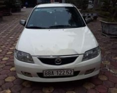 Mazda 323 2002 - Chính chủ bán ô tô Mazda 323 sản xuất năm 2002, màu trắng giá 130 triệu tại Hà Nam